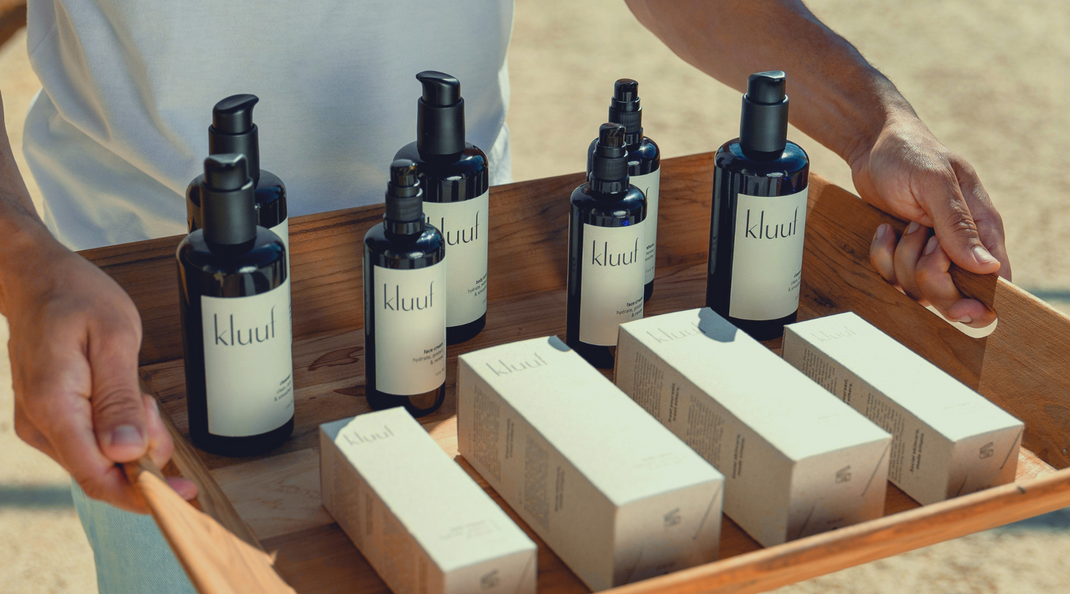 kluuf's entire sustainable product collection for men on a tray